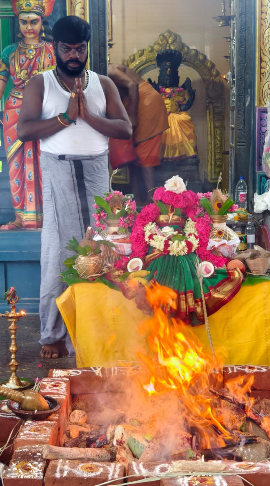 Kalasam and sacred fire at a temple