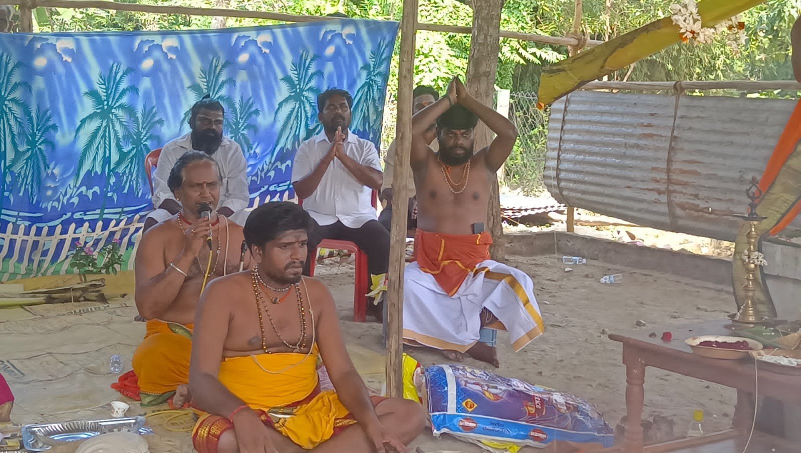 Priests chanting during a remedial ceremony